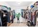 Spacious walk-in closet with ample storage, shelving, and hanging space at 4280 Pioneer Pl, Brighton, CO 80601