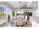 Inviting breakfast nook with deck access, scenic views, and stainless steel kitchen appliances at 47 Herrn Ln, Castle Pines, CO 80108