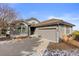 Charming single Gathering home featuring stone accents, a two car garage, and beautiful architectural detail at 47 Herrn Ln, Castle Pines, CO 80108