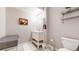 Neat half-bathroom featuring a new vanity and decorative shelf for an inviting space at 11829 Deorio St, Parker, CO 80134