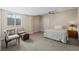 Basement bedroom with sitting area and window at 15994 La Plata Peak Pl, Broomfield, CO 80023