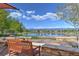 Scenic pond view with mountain backdrop from a park bench at 15994 La Plata Peak Pl, Broomfield, CO 80023