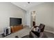 Recreation room with TV, seating, and adjacent bathroom access at 15994 La Plata Peak Pl, Broomfield, CO 80023