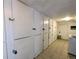 Basement storage lockers for residents featuring combination lock security and tile floor at 1135 N Elizabeth St # 102, Denver, CO 80206