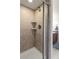 Stand up shower with decorative stone accent at 4511 Perry St, Denver, CO 80212