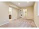 Spacious bedroom shows an adjacent bathroom and closet at 2605 Gray Wolf Loop, Broomfield, CO 80023