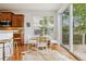 Dining area with hardwood floors, natural light, and access to the kitchen at 2605 Gray Wolf Loop, Broomfield, CO 80023