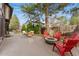 Backyard patio featuring cozy seating and a fire pit for outdoor entertaining and relaxation at 2011 S Gray Dr, Lakewood, CO 80227