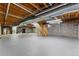 Spacious unfinished basement featuring utilities and ample room for storage or customization at 2011 S Gray Dr, Lakewood, CO 80227