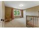 Cozy bedroom with a rocking chair and crib, featuring a large window at 2011 S Gray Dr, Lakewood, CO 80227