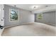 Spacious bonus room with neutral walls, carpeting, and natural light at 2011 S Gray Dr, Lakewood, CO 80227