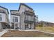 Modern townhouse with multi-level balconies and stone facade at 1462 Yates St, Denver, CO 80204