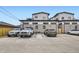 Outdoor parking lot with marked spaces for residents at 1462 Yates St, Denver, CO 80204