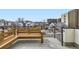 Outdoor patio with bench seating and views of the neighborhood at 1462 Yates St, Denver, CO 80204