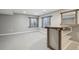 Finished basement with carpet and bar with granite countertop at 3982 S Himalaya Way, Aurora, CO 80013
