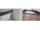 Bathroom features a dark countertop and a modern-style sink at 3982 S Himalaya Way, Aurora, CO 80013