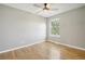 Bedroom with neutral walls, new carpet, ceiling fan, and a window with natural light at 3982 S Himalaya Way, Aurora, CO 80013