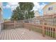 The deck features a brown wood design, and it has a fence around the perimeter at 3982 S Himalaya Way, Aurora, CO 80013