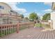 The deck has a brown wood design, plus a fence around the whole thing at 3982 S Himalaya Way, Aurora, CO 80013