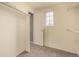 Walk-in closet with ample storage space and a window at 7501 S Ivanhoe Cir, Centennial, CO 80112