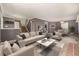 Open concept living space with a seamless flow between living and dining areas at 7501 S Ivanhoe Cir, Centennial, CO 80112