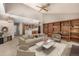 An open floor plan integrates the living room with a kitchen, enhancing flow and connectivity at 7501 S Ivanhoe Cir, Centennial, CO 80112