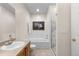 Bright bathroom featuring a tub, tiled shower, and vanity with a stone countertop at 9307 Amison Cir # 202, Parker, CO 80134