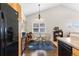 Cozy dining area adjacent to kitchen boasting hardwood floors and lots of natural light at 9307 Amison Cir # 202, Parker, CO 80134