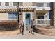 Welcoming front door with wreath and decorative stone accents, leading to a charming residence at 9307 Amison Cir # 202, Parker, CO 80134