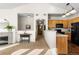 Bright and airy living space connecting to the kitchen through an open archway and offering lots of natural light at 9307 Amison Cir # 202, Parker, CO 80134