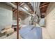 Unfinished basement with exposed beams and a concrete foundation offers the potential for customization at 5631 Silver Bluff Ct, Parker, CO 80134