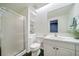 Clean, bright bathroom with shower, vanity, and well-organized shelving at 5631 Silver Bluff Ct, Parker, CO 80134