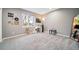 Neutral bedroom with plush carpet, large window, and ample space for personalized decor at 5631 Silver Bluff Ct, Parker, CO 80134