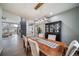 Formal dining room features a modern chandelier and ample seating at 5631 Silver Bluff Ct, Parker, CO 80134
