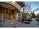 Inviting front entrance with a stone walkway and a covered porch at 5631 Silver Bluff Ct, Parker, CO 80134