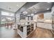 Spacious kitchen with granite counters, stainless steel appliances, and a breakfast nook overlooking the backyard at 5631 Silver Bluff Ct, Parker, CO 80134