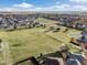 Aerial shot of a neighborhood showcasing lush green spaces and parks, providing a sense of community and recreation at 410 Clover Ct, Frederick, CO 80530