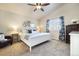 Main bedroom with high ceilings, ceiling fan and a large window with shutters at 410 Clover Ct, Frederick, CO 80530