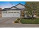 Lovely home with a three-car garage and manicured lawn, enhanced by tasteful landscaping and a charming entrance at 410 Clover Ct, Frederick, CO 80530
