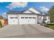 Charming two-story home with a three-car garage, manicured landscaping, and a welcoming front porch at 410 Clover Ct, Frederick, CO 80530