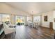 Open floor plan with spacious living and dining areas. Backyard views from many windows at 410 Clover Ct, Frederick, CO 80530