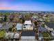 An aerial view highlighting the house within the suburban community at 2926 S Cherokee St, Englewood, CO 80110