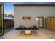 Cozy backyard with a modern fire pit, comfortable seating, and clean architectural lines offering a private outdoor space at 2926 S Cherokee St, Englewood, CO 80110