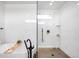 Bathroom highlighting the soaking tub and glass-enclosed shower at 2926 S Cherokee St, Englewood, CO 80110