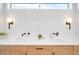Bathroom with a sleek, double sink vanity and trendy black faucets at 2926 S Cherokee St, Englewood, CO 80110
