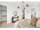 Spacious bedroom with large closet and a stylish console table and mirror at 2926 S Cherokee St, Englewood, CO 80110