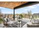 Relaxing outdoor deck with modern furniture and an open railing providing beautiful city views at 2926 S Cherokee St, Englewood, CO 80110