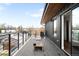 Expansive deck with modern railings, wood ceiling, and scenic views for outdoor enjoyment at 2926 S Cherokee St, Englewood, CO 80110