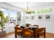 Elegant dining area boasts stylish seating, natural light, and modern décor at 2926 S Cherokee St, Englewood, CO 80110