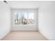Empty room featuring a large window offering plenty of natural light at 2926 S Cherokee St, Englewood, CO 80110